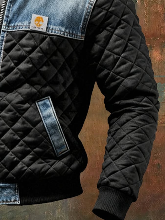 Veste matelassée noire Danoir Paris avec détails en jean, style élégant et décontracté, pour femmes.
