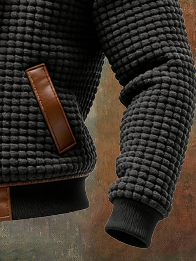 Veste texturée à finitions en cuir embossé Maison Clément Paris™ par Danoir Paris, noire, avec détails élégants.