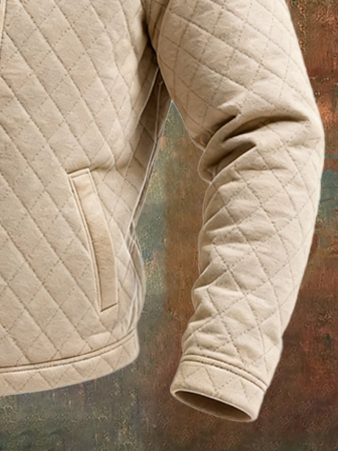 Veste matelassée beige pour femme de Danoir Paris, avec empiècements en cuir, style élégant et moderne.