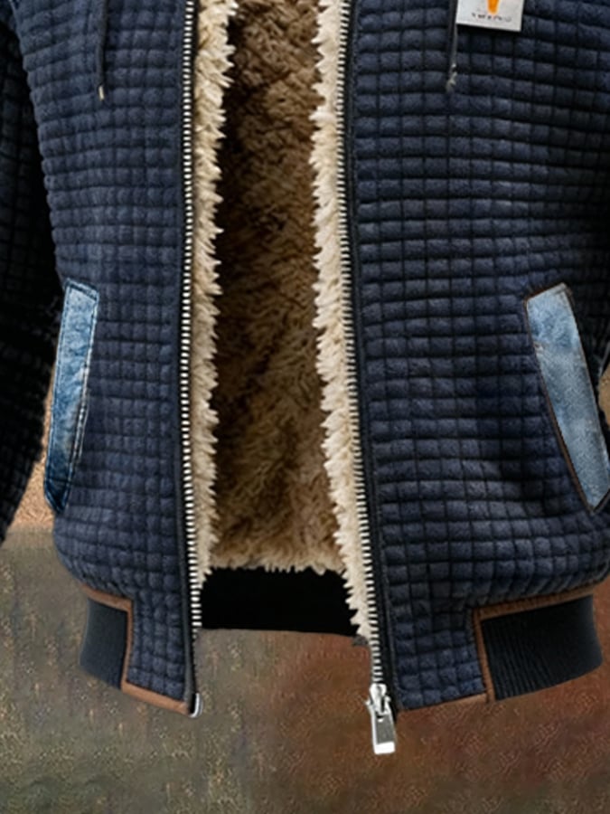 Veste matelassée bleue marine Danoir Paris avec détails en jean, style élégant et chaud pour l'automne et l'hiver.