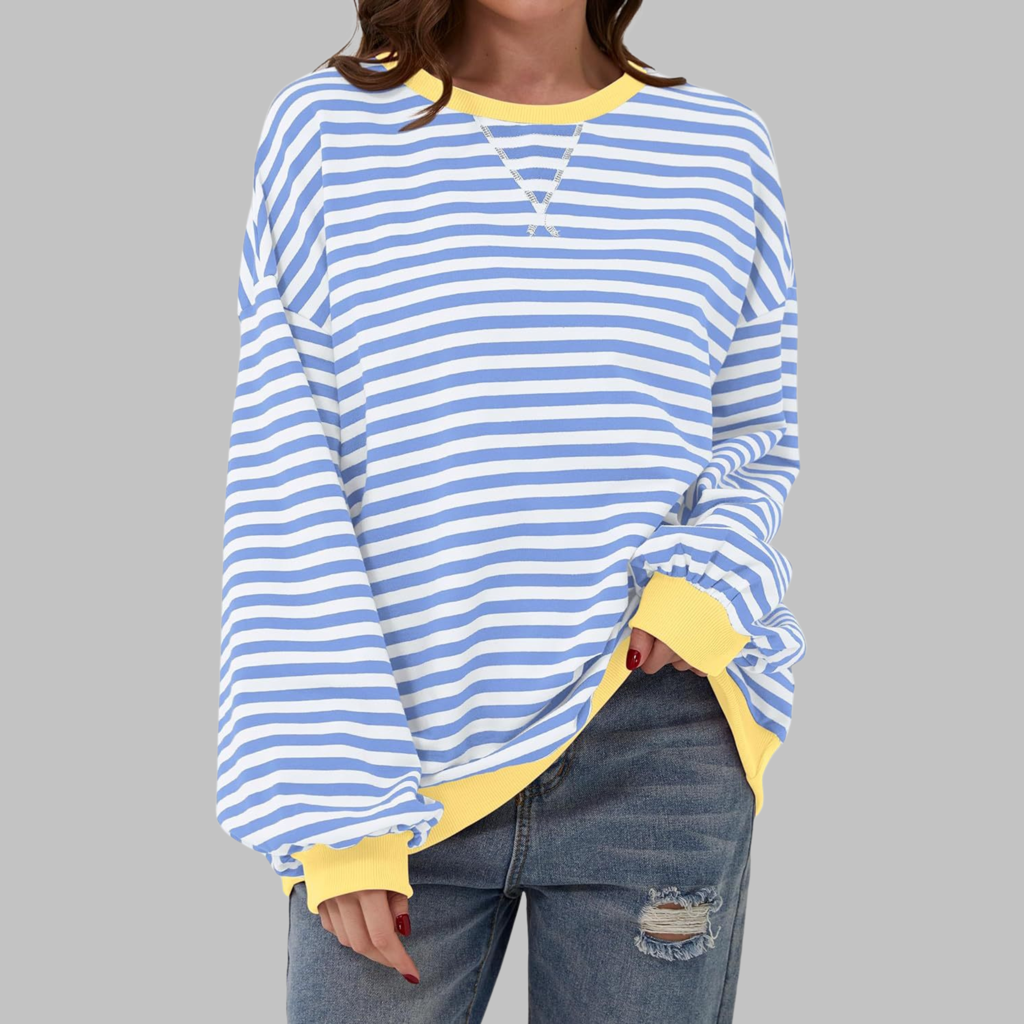 Sweatshirt à manches longues et col rond Danoir Paris, rayures roses, style décontracté et confortable, pour un look casual.