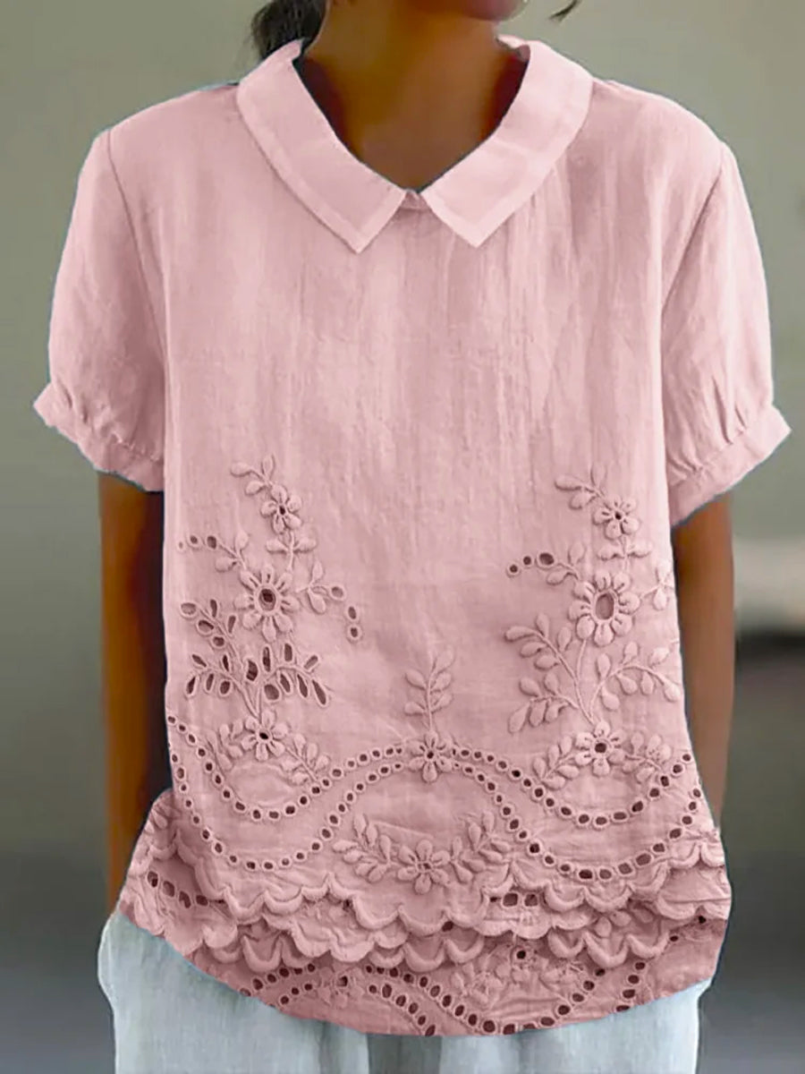 Chemise florale brodée Lily de Danoir Paris, en tissu rose avec motifs floraux et détails brodés.