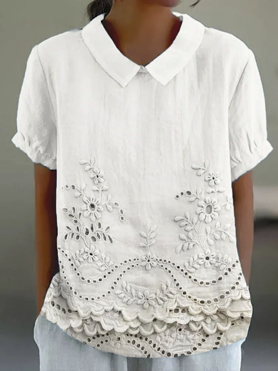 Chemise rose Lily de Danoir Paris avec broderie florale délicate, manches longues et coupe élégante.