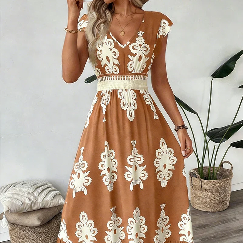 Robe maxi noire Danoir Paris Candela en tissu baroque avec décolleté en V, élégante et sophistiquée pour soirée.