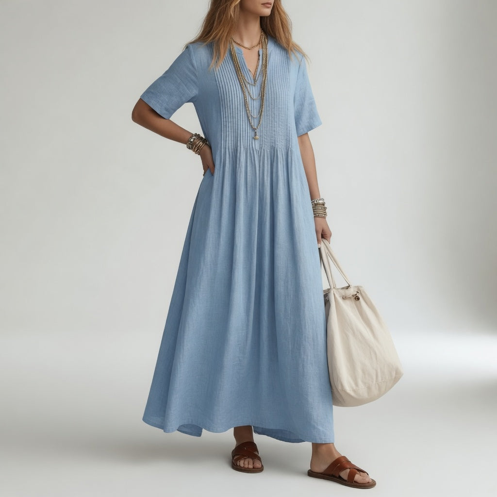Robe longue en coton Pélagie™ Danoir Paris, col V, couleur rose rouge, esprit liberté estivale, portée légère et élégante.