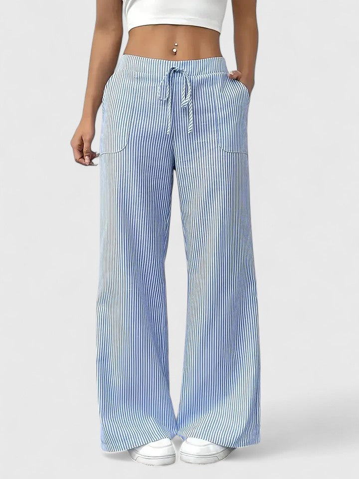 Pantalon large élégant Dominique de Danoir Paris, tissu fluide rose avec coupe sophistiquée, porté sur mannequin.