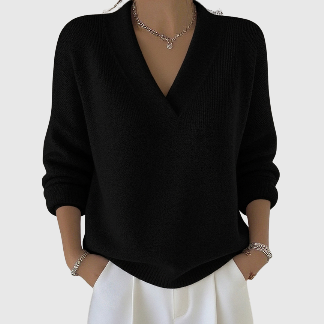 Pull à col V doux Danoir Paris, coupe décontractée, en tissu confortable, couleur rose, porté sur mannequin.