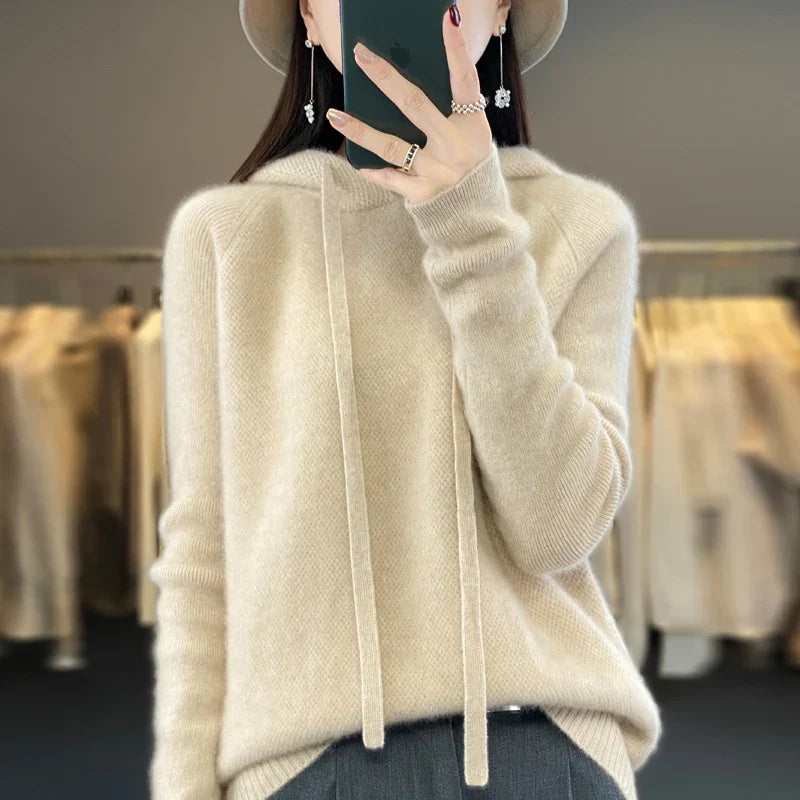 Écharpe douce en mérinos rose Hermine de Danoir Paris, idéale pour l'hiver, avec texture moelleuse et finition élégante.