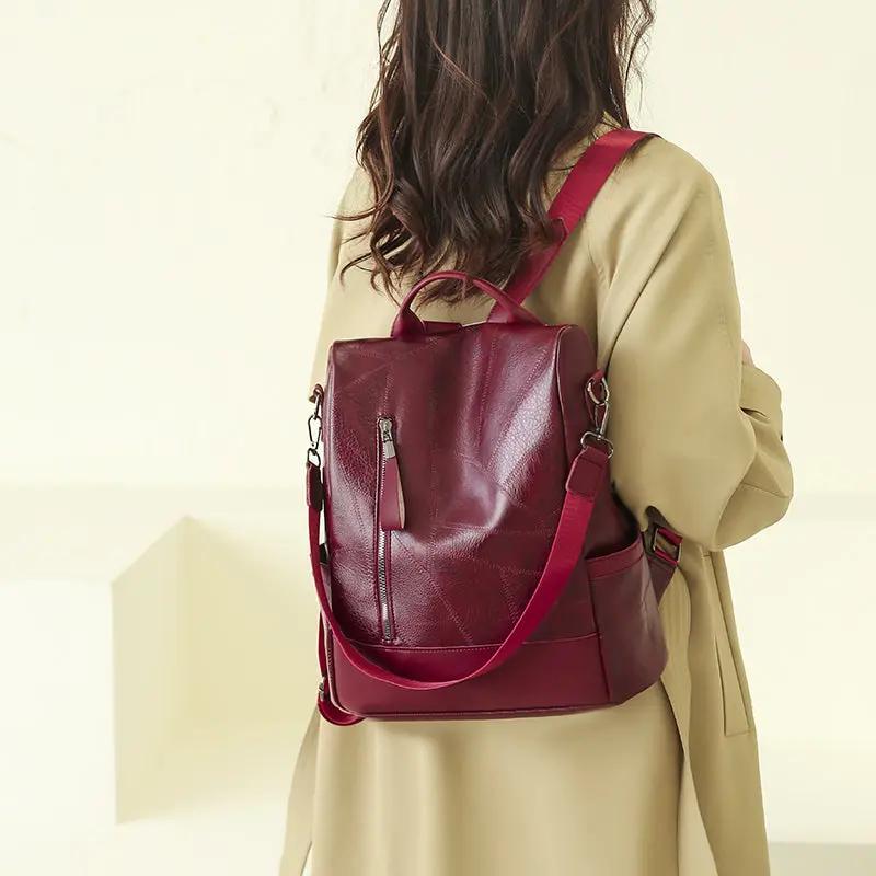 Sac à main rouge Freya de Danoir Paris, en cuir, avec poignées, idéal pour un usage quotidien et les aventures.