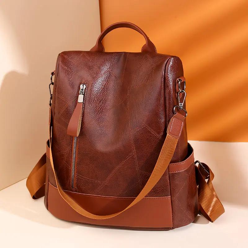 Sac à main rouge Freya de Danoir Paris, sac quotidien en cuir avec poignées et fermeture zippée, idéal pour les aventures quotidiennes.