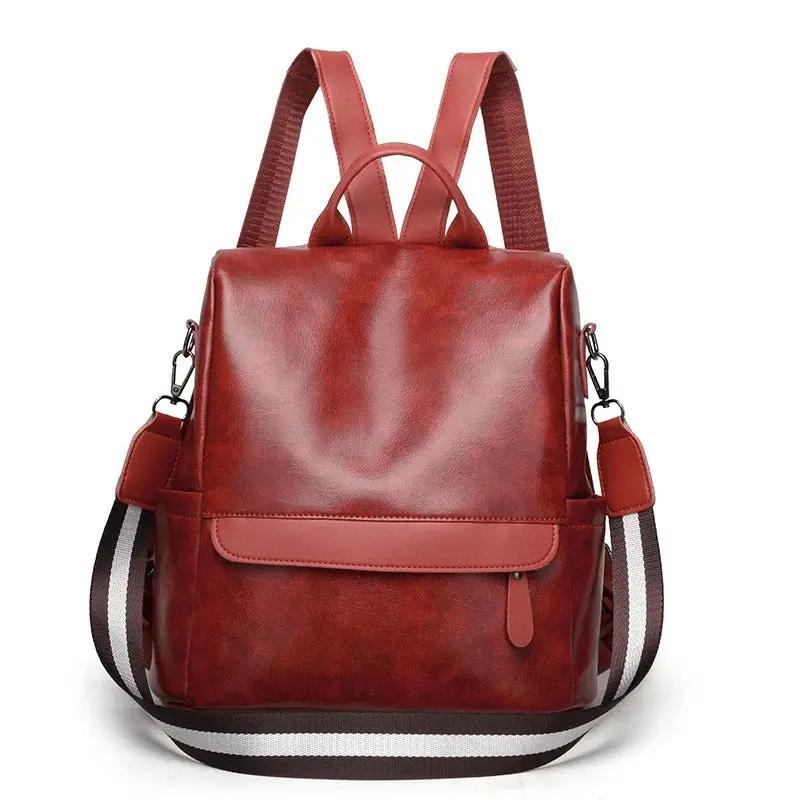 Sac à dos explorateur Lydia de Danoir Paris, rouge, avec compartiments pratiques pour un usage quotidien.