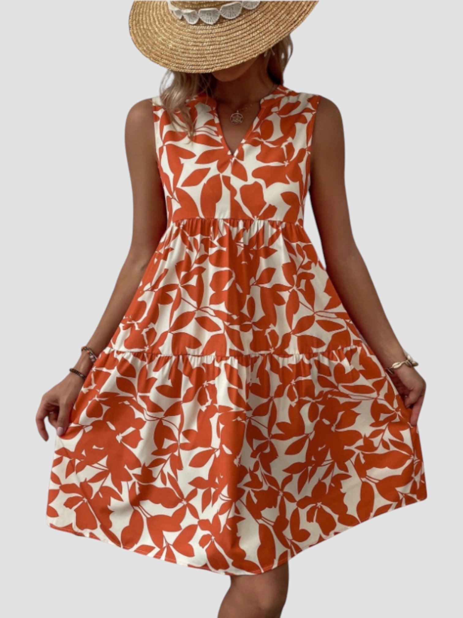 Robe midi d'été élégante Danoir Paris, couleur rouge, tissu léger et fluide, parfaite pour une tenue sophistiquée.