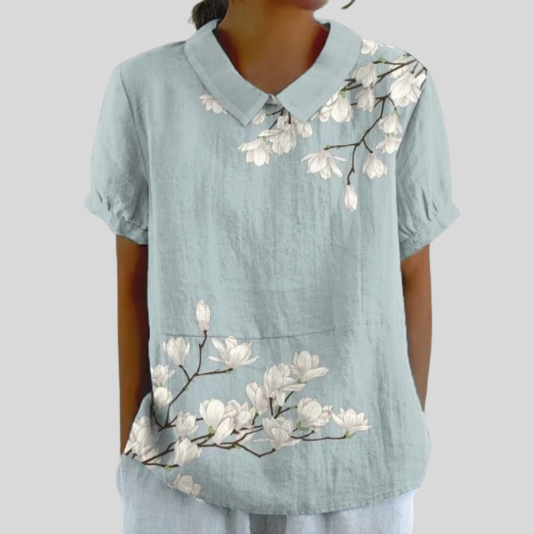 Blouse fleurie Danoir Paris, modèle Aurore avec motif floral placé, vue de face, tissu léger et élégance féminine.