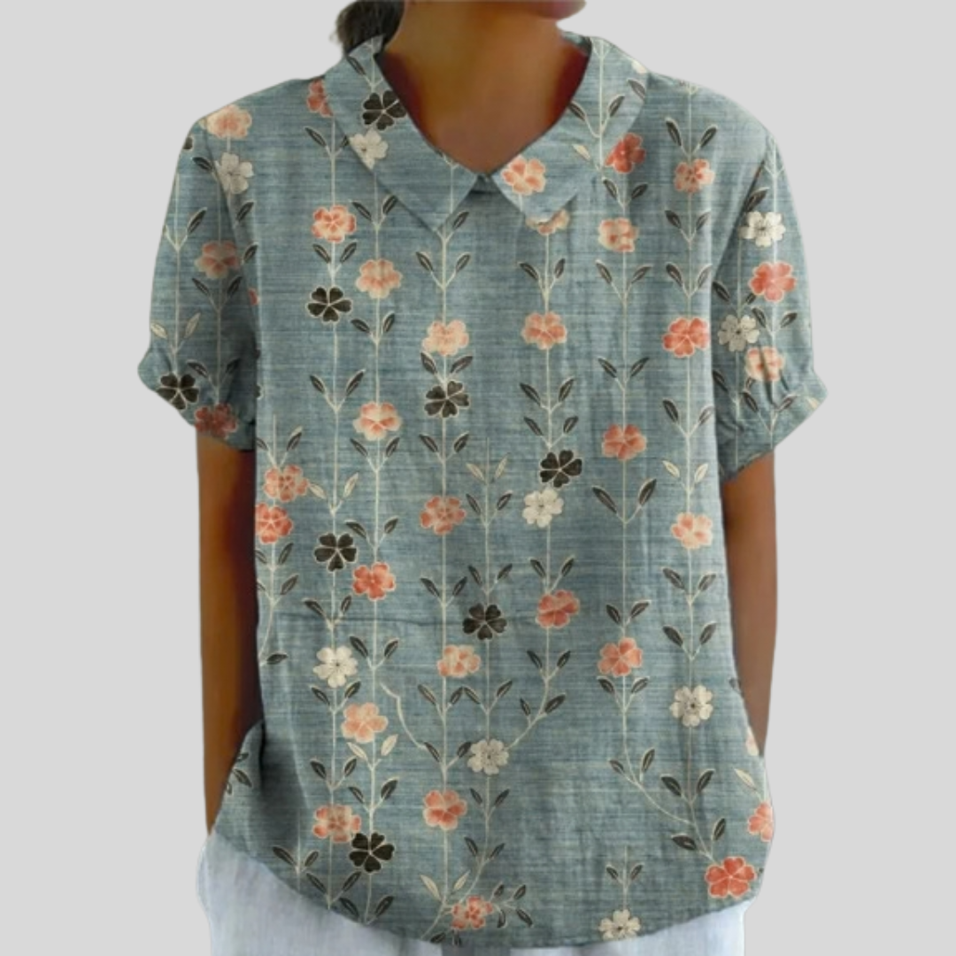 Blouse Élora à fleurs alignées de Danoir Paris, tissu léger et design élégant, portée décontractée ou habillée.