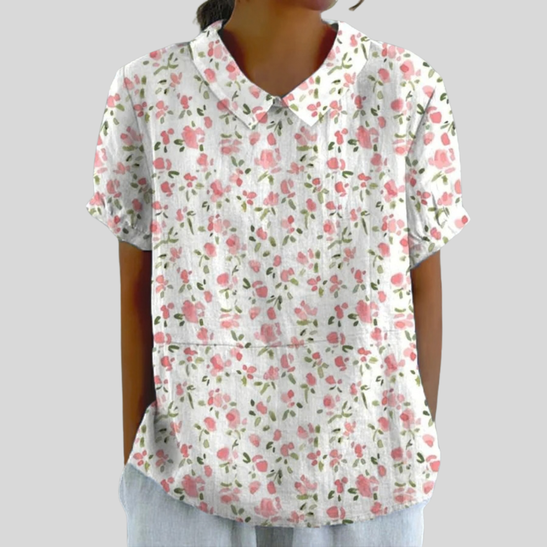 Blouse Juliette Danoir Paris à fleurs miniatures, tissu léger, manches longues et décolleté en V, style élégant et féminin.