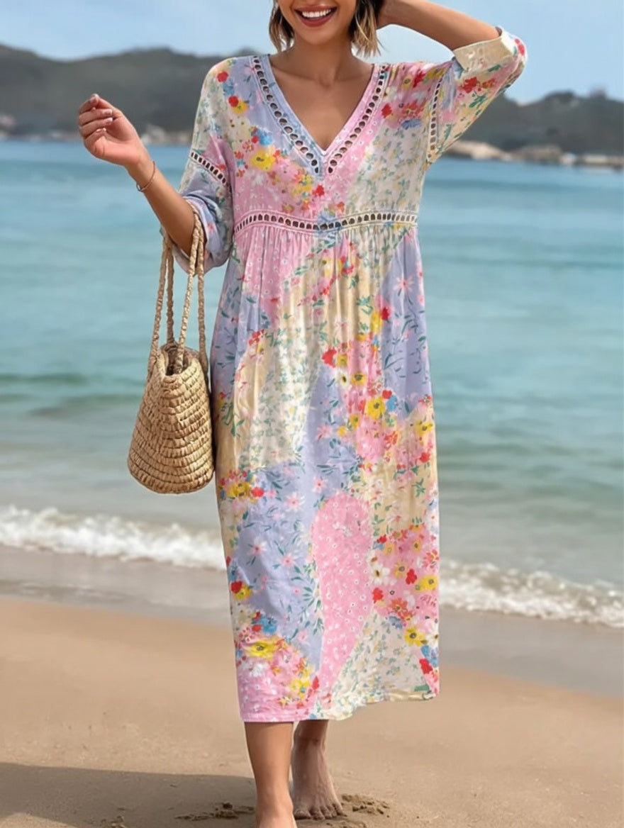 Robe fluide florale Lysiane™ de Danoir Paris avec motif estival, tissu léger et coupe élégante, parfaite pour l'été.