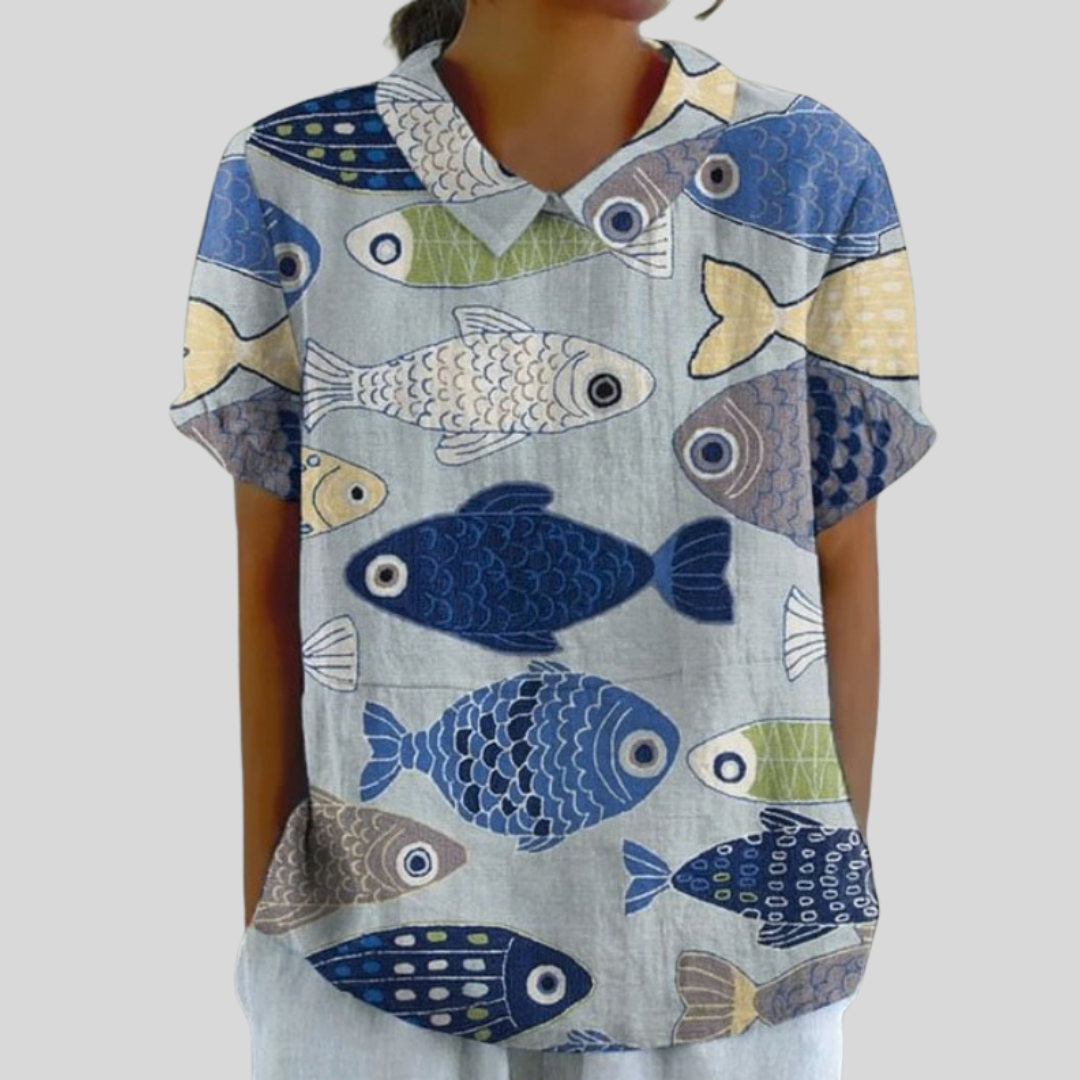 Blouse Marianne Danoir Paris à motif marin avec manches longues et col en V, tissu léger et élégant.