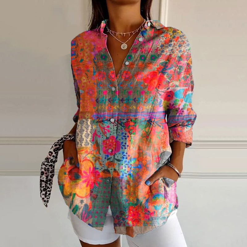 Blouse vintage élégante Danoir Paris, couleur orange, avec détails sophistiqués, portée par un mannequin.