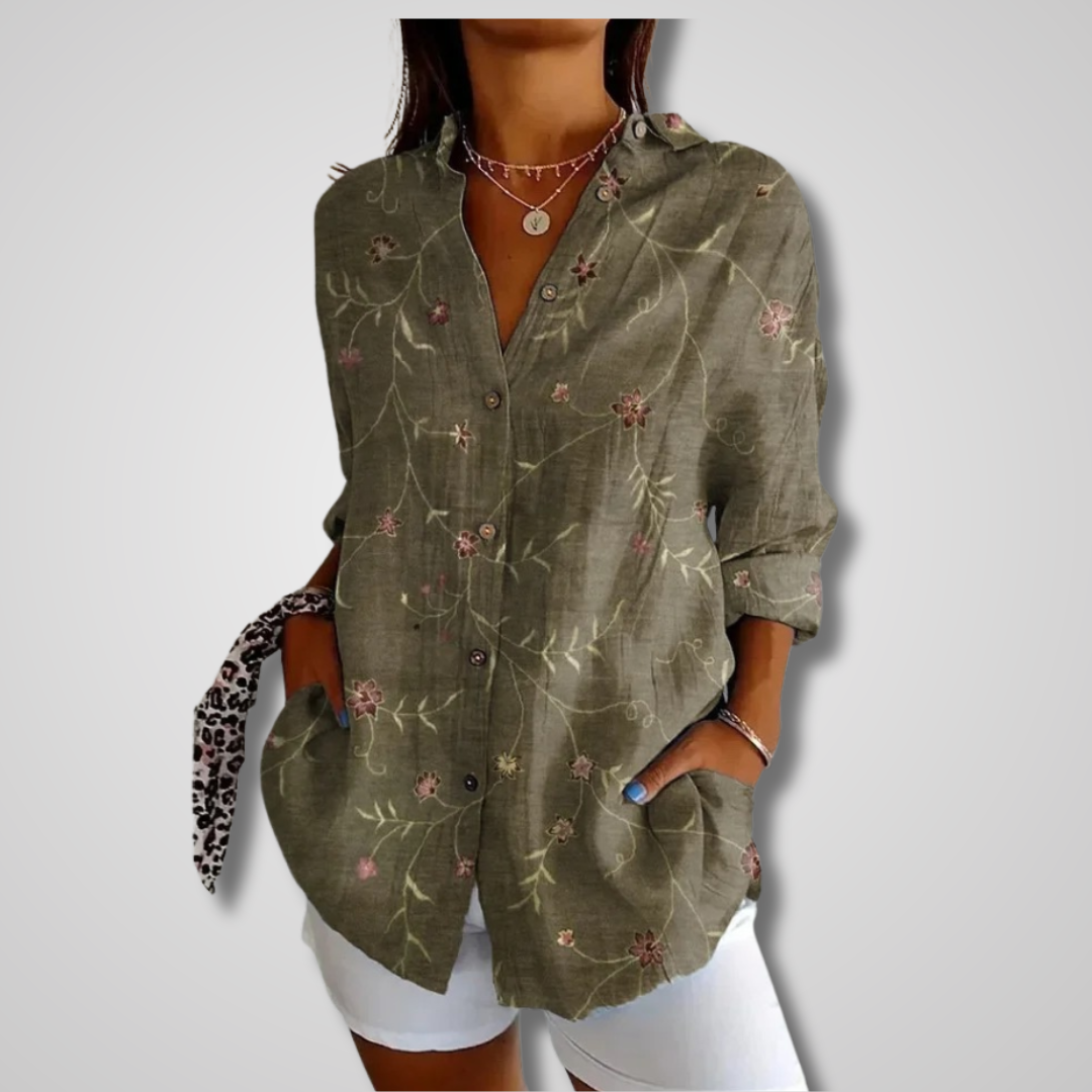 Blouse vintage élégante Danoir Paris orange avec détails sophistiqués, vue de face sur mannequin.