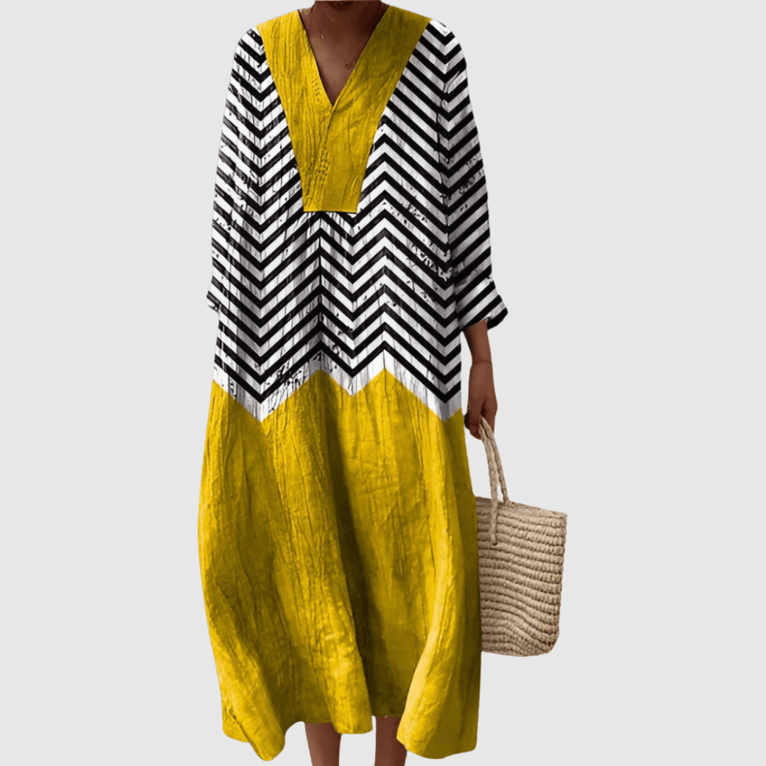 Robe Mélodie Tessa™ de Danoir Paris en tissu fluide, avec détails élégants et coupe flatteuse, portée sur mannequin.