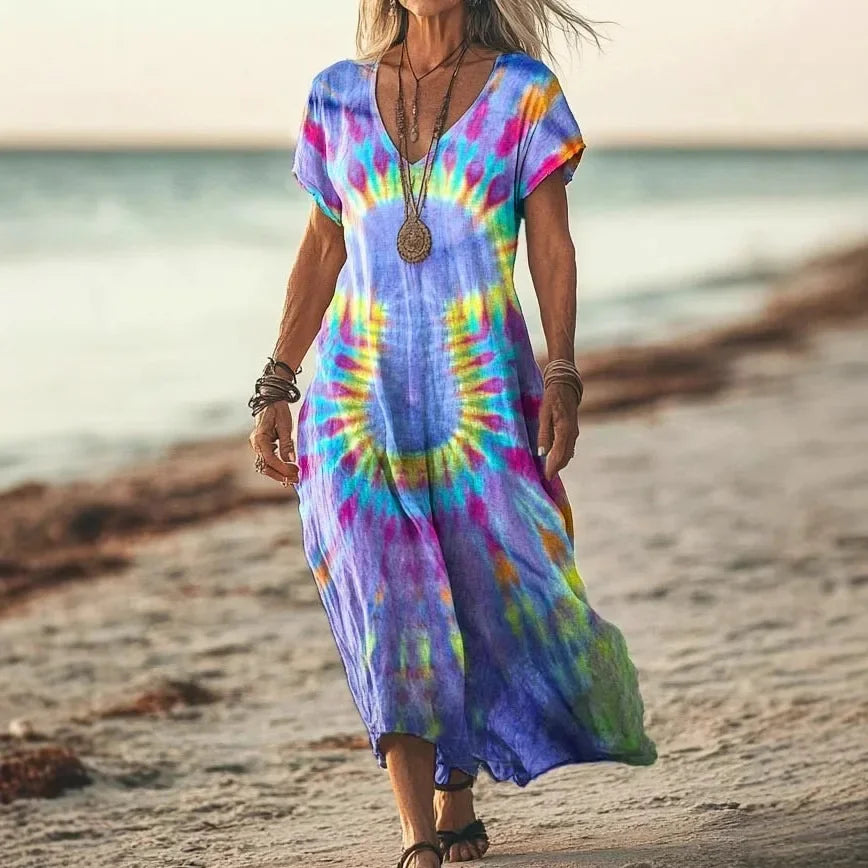 Robe longue Danoir Paris Isola à imprimés naturels et coupe aérienne, tissu léger et fluide, couleur jaune tie-dye.