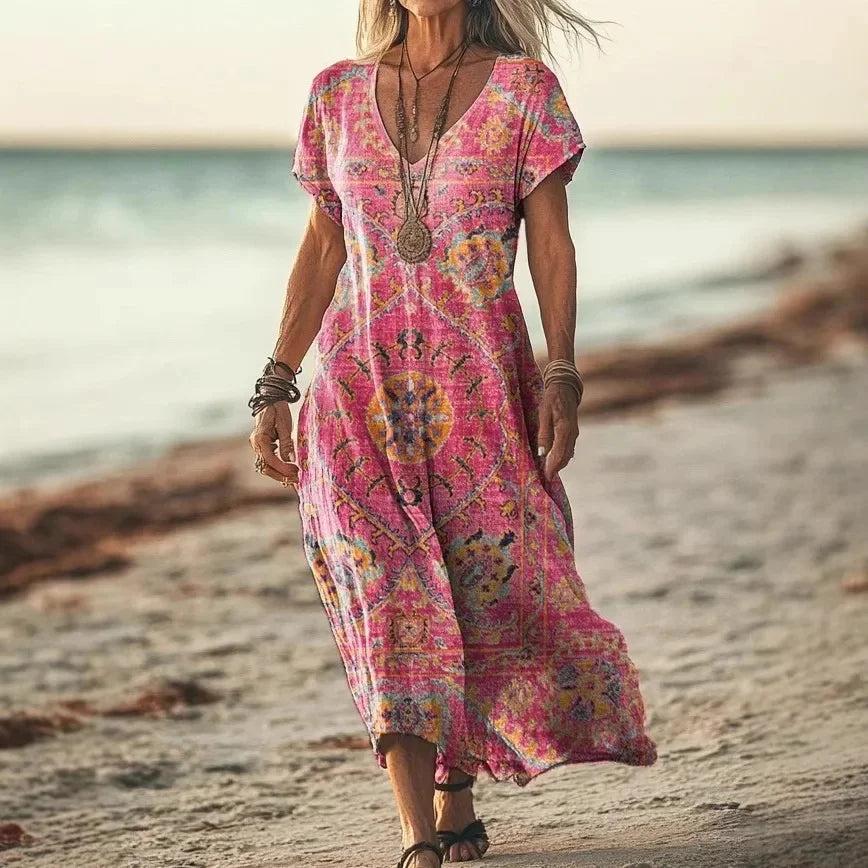 Robe longue Danoir Paris Isola à imprimés naturels et coupe aérienne, tissu léger et fluide, couleur jaune tie-dye.