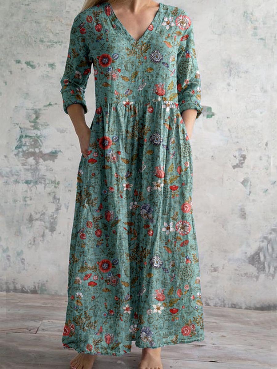 Robe chic et aérée Christinia de Danoir Paris, en tissu léger vert avec détails élégants et coupe fluide.