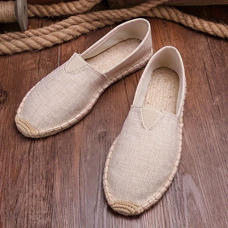 Espadrilles élégantes pour hommes Danoir Paris, chaussures blanches en toile avec semelle en corde.