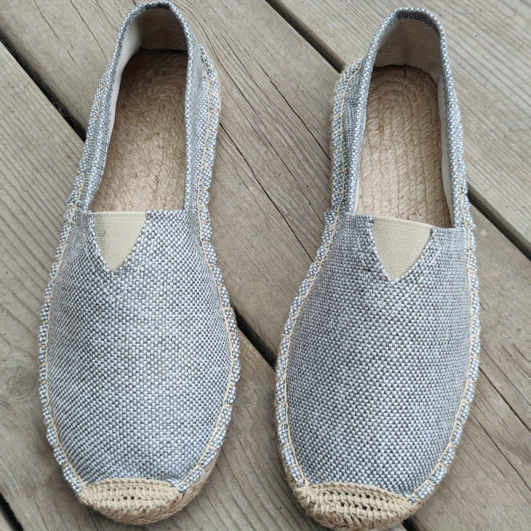 Chaussures élégantes pour hommes Danoir Paris espadrilles blanches en toile, semelle en corde, style sophistiqué.