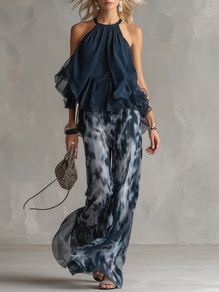 Veste et pantalon large Danoir Paris Elise, costume élégant et léger en tissu fluide bleu marine, adapté pour un look chic et confortable.