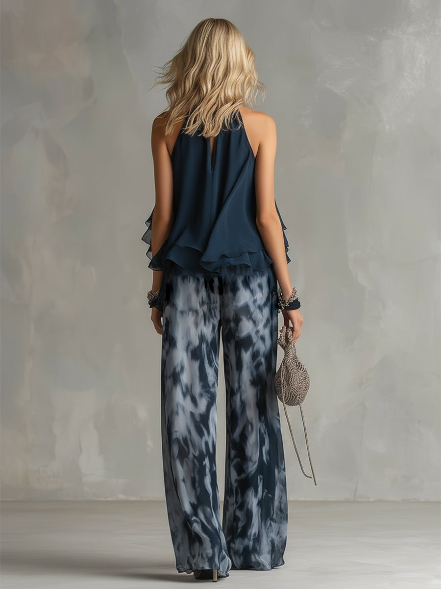 Ensemble élégant Danoir Paris Elise, costume léger avec haut fluide bleu marine et pantalon large pour femmes.