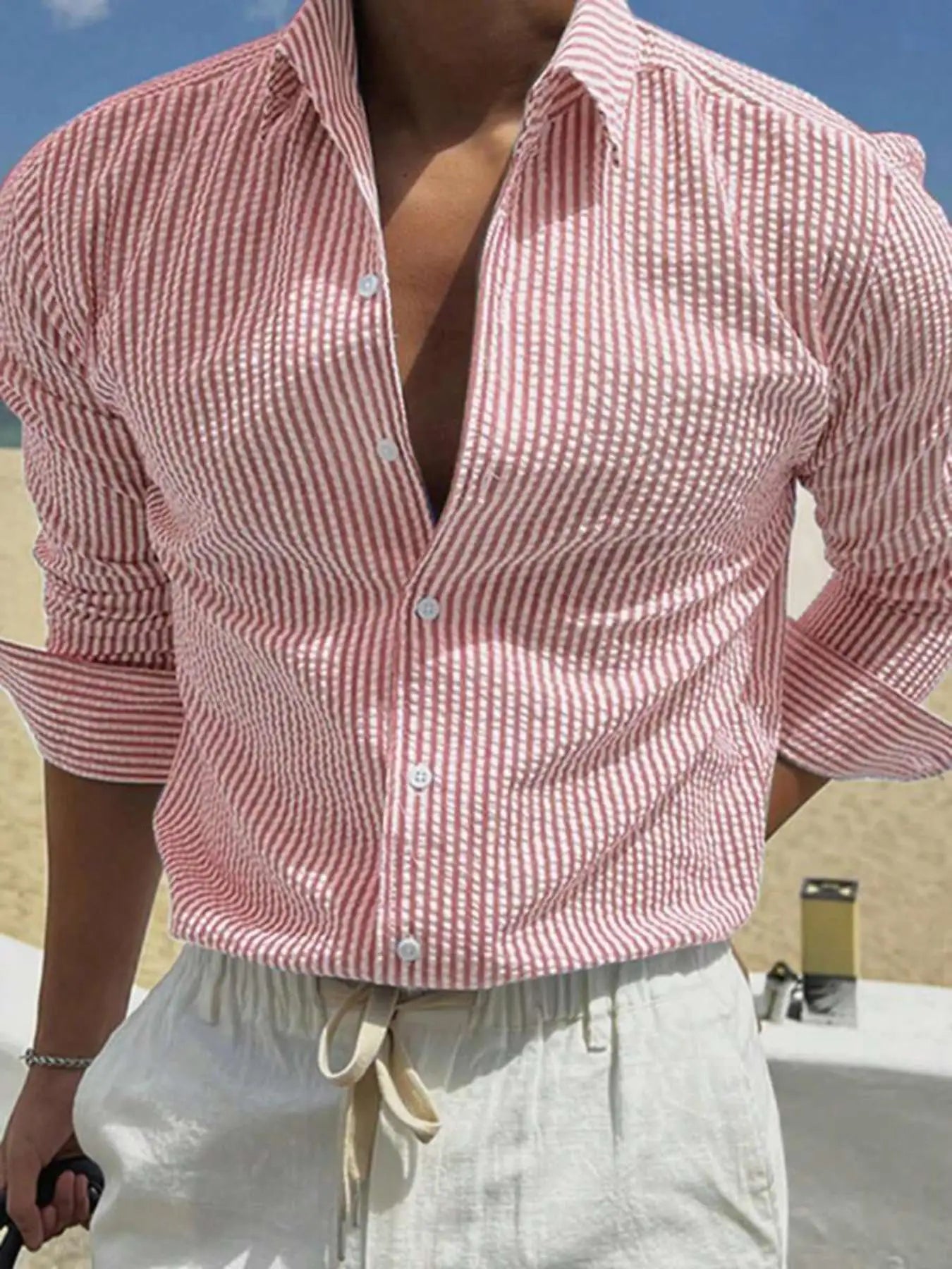 Chemise homme Danoir Paris à rayures bleues et blanches, manches longues, style élégant et classique.