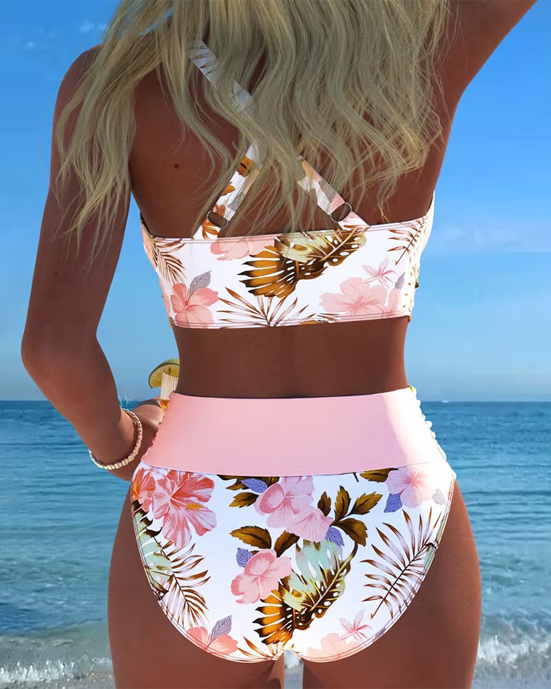 Maillot de bain Eduarda Danoir Paris avec motif floral contrastant et fente, style élégant et féminin.