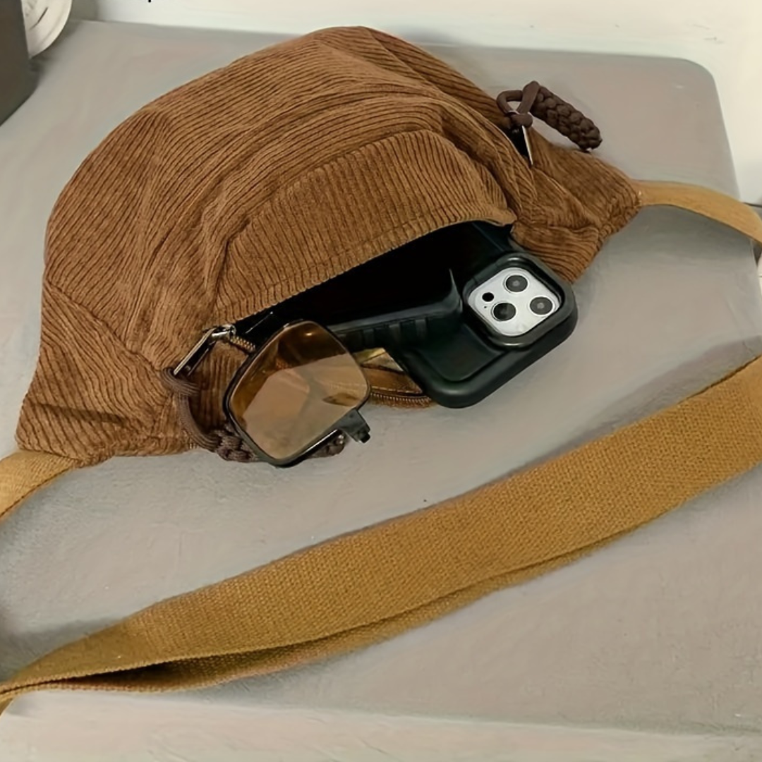 Sac à bandoulière Danoir Paris Petra en velours côtelé vert, élégant et tendance, avec poignées et détails sophistiqués.