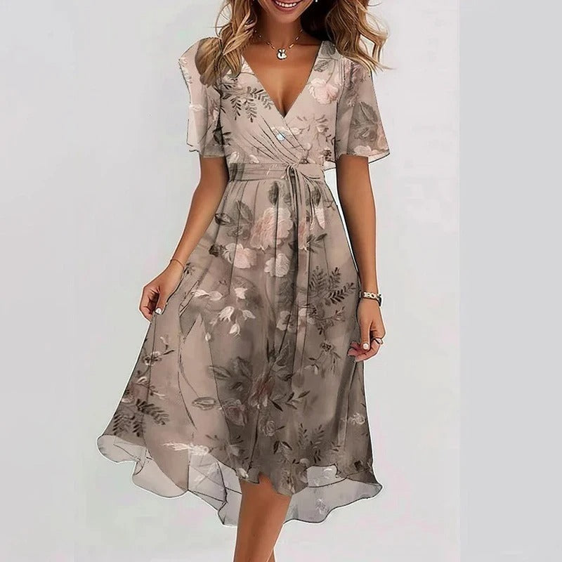 Robe florale élégante Yara de Danoir Paris, couleur vert clair, avec détails floraux, portée élégante pour femmes