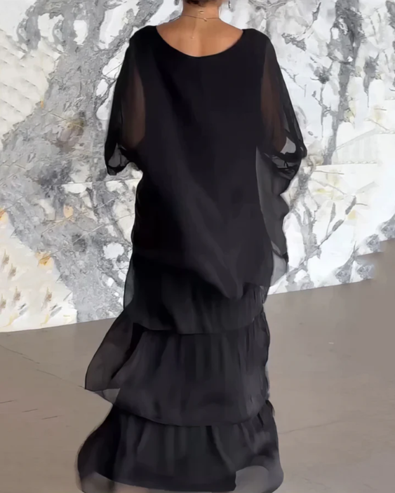 Robe longue fluide élégante Lara de Danoir Paris en vert délavé, tissu léger et chic pour une silhouette sophistiquée.