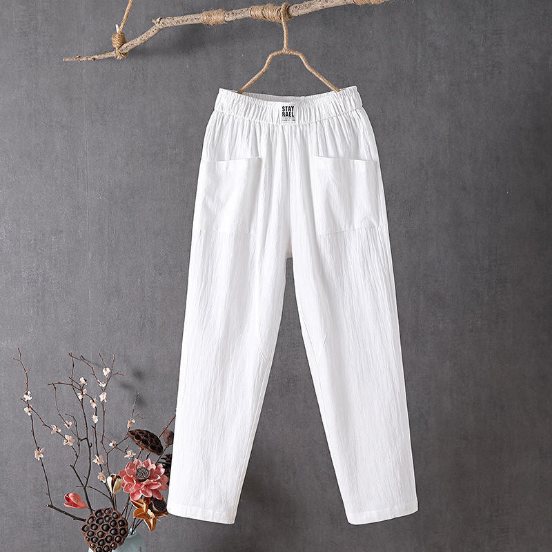 Pantalons relaxés Danoir Paris Alyra en vert avec poches, tissu confortable et coupe décontractée pour un style casual.