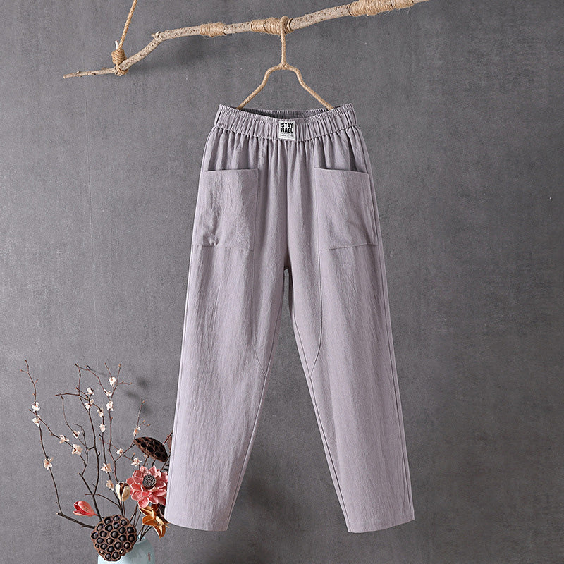 Pantalons relaxés Danoir Paris Alyra en vert avec poches, tissu confortable et coupe décontractée.