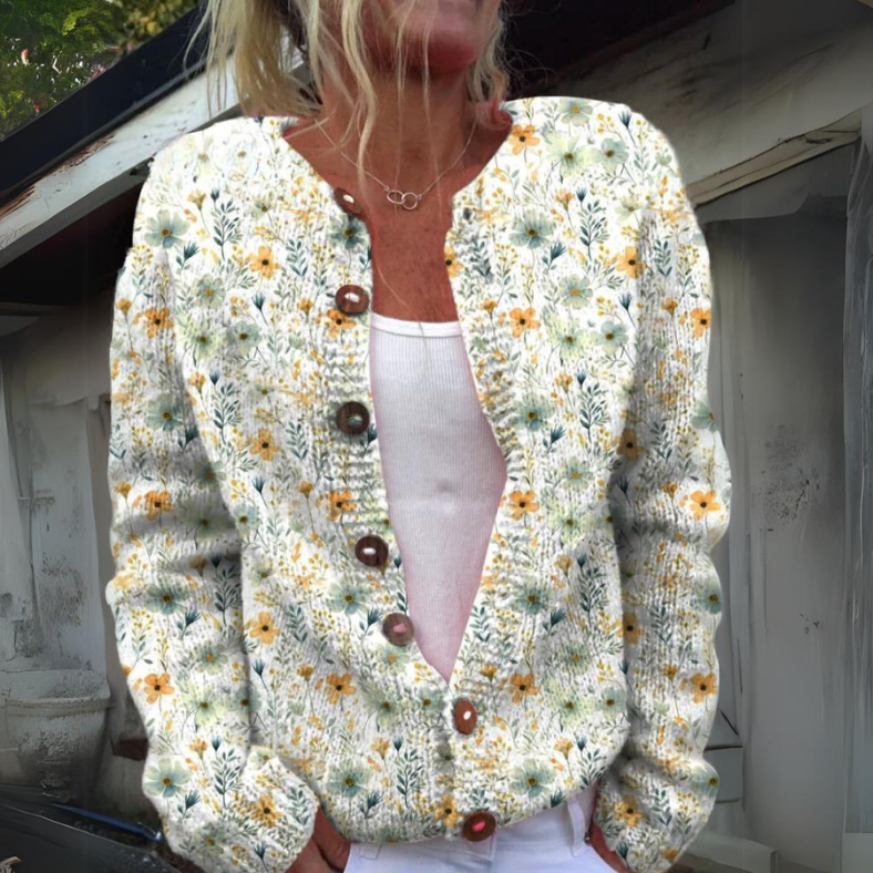 Cardigan floral élégant Amelie de Danoir Paris en vert avec motifs floraux, porté sur un mannequin.