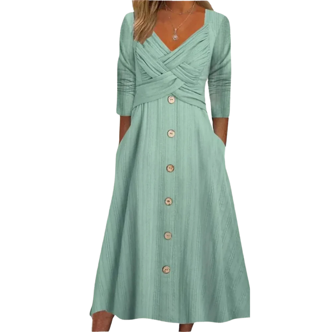 Robe élégante Danoir Paris Ella avec couverture du ventre, tissu vert, coupe fluide et style sophistiqué.