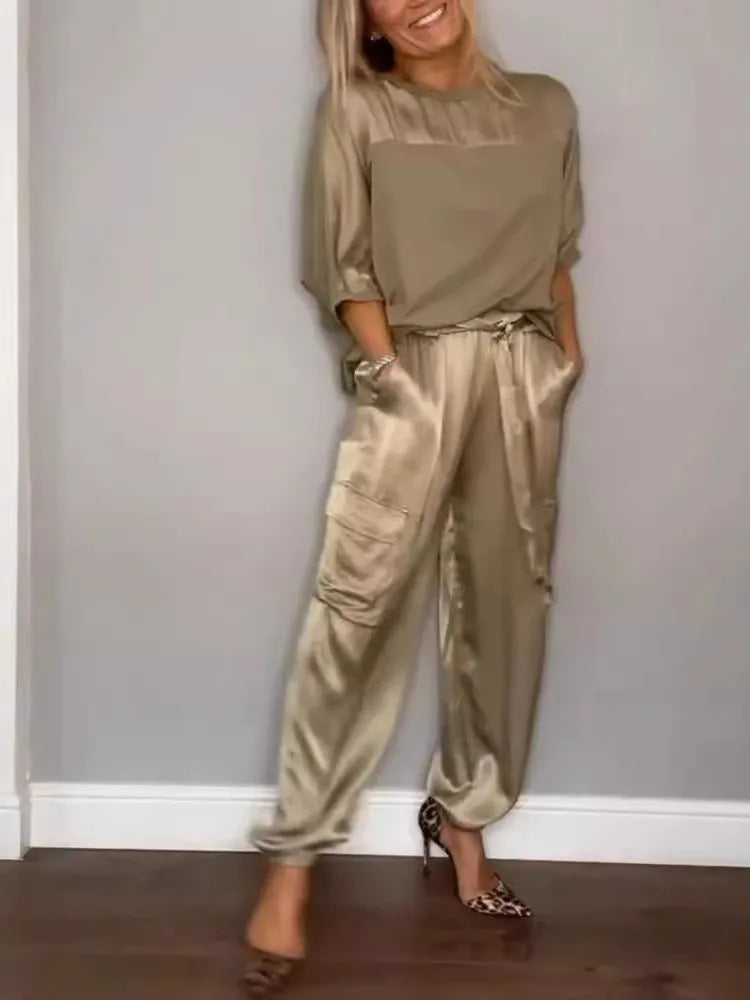 Veste décontractée Danoir Paris Evelina en satin vert avec coupe élégante et détails modernes, vue de face.
