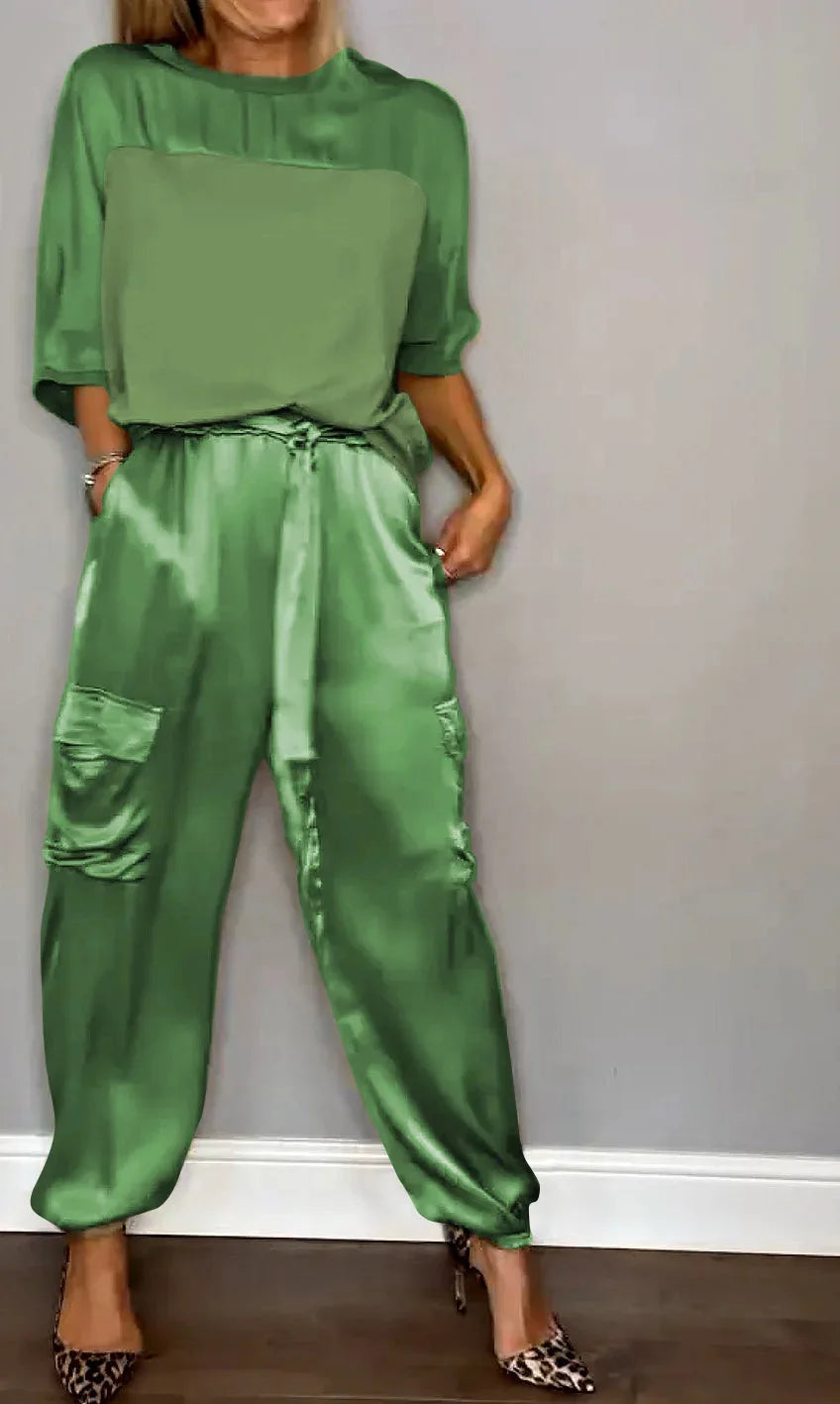 Veste décontractée Evelina Danoir Paris en satin vert avec finition élégante et coupe confortable.