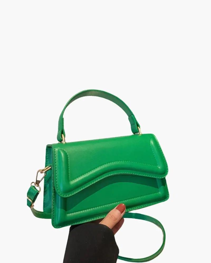 Sac à main blanc Danoir Paris Ibiza, élégant et spacieux, avec poignées en cuir et design moderne visible sur l'image.
