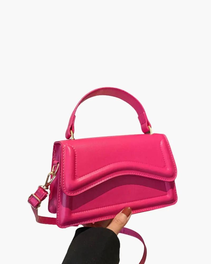 Sac à main blanc Danoir Paris Ibiza, en cuir élégant avec poches intérieures, pour un style chic et pratique.