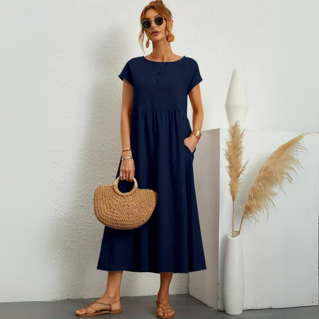 Robe midi décontractée en coton blanche Danoir Paris pour femmes, silhouette fluide et élégant style casual.