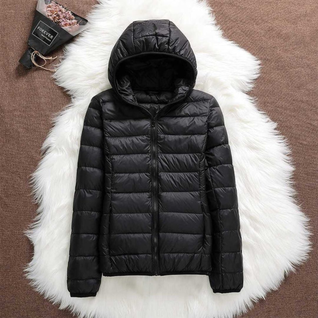 Doudoune verte menthe Danoir Paris Peka pour femmes, veste chaude et légère en tissu imperméable.