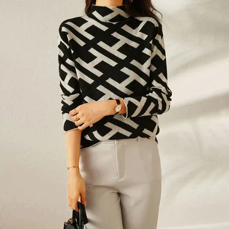 Pull doux et élégant Eloise de Danoir Paris, en taille XS, en laine moelleuse avec un design chic et sophistiqué.