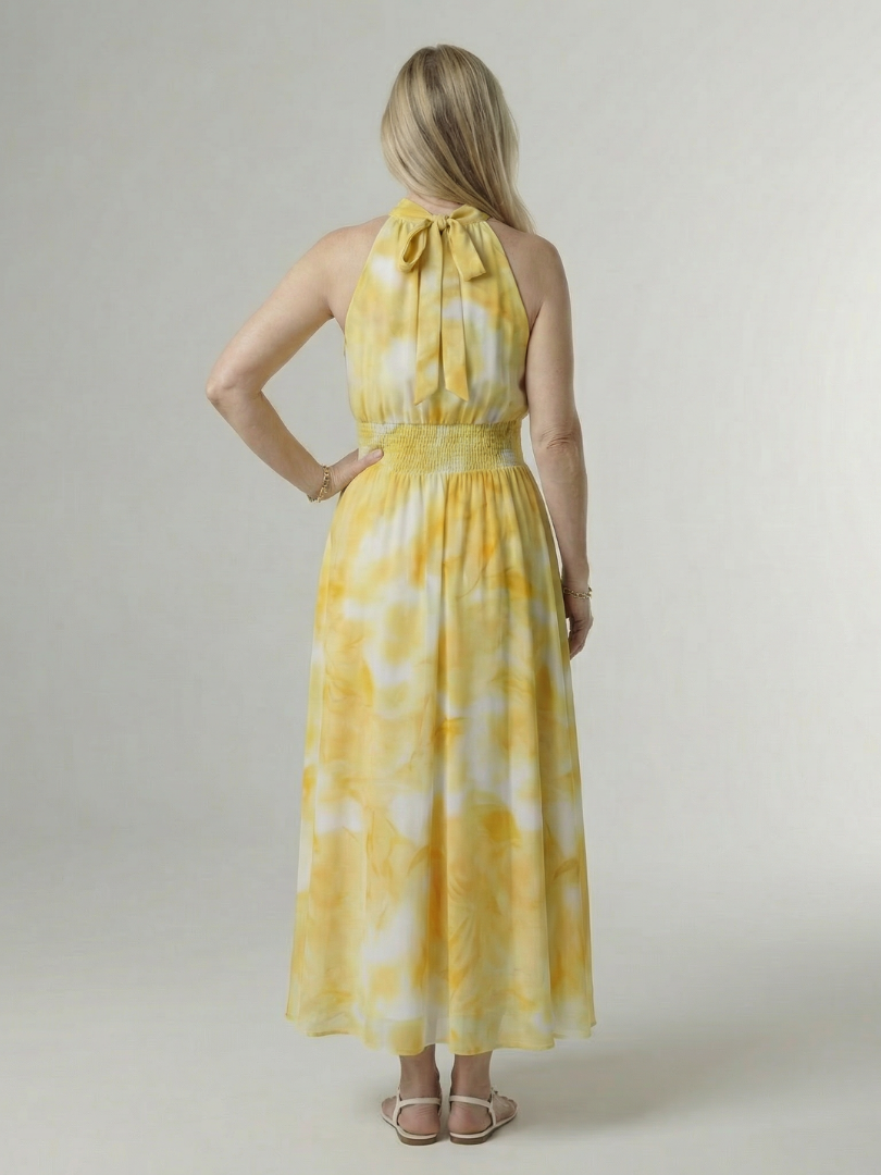 Robe midi jaune Danoir Paris Sylin à col halter avec détails froncés, portée élégante et fluide, vue de face.