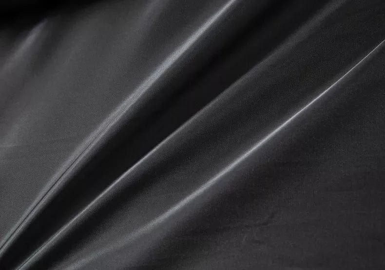 Veste d’hiver élégante Danoir Paris en noir, avec coupe sophistiquée et détails stylés, adaptée pour l’hiver.