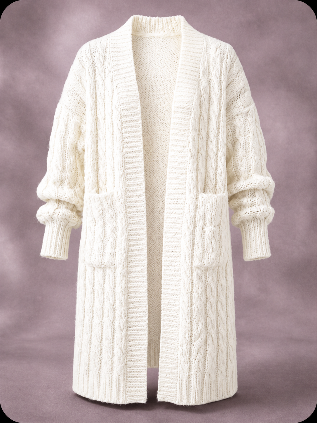 Cardigan en maille à double boutonnage Danoir Paris porté par un mannequin, détail des boutons et texture de la maille.